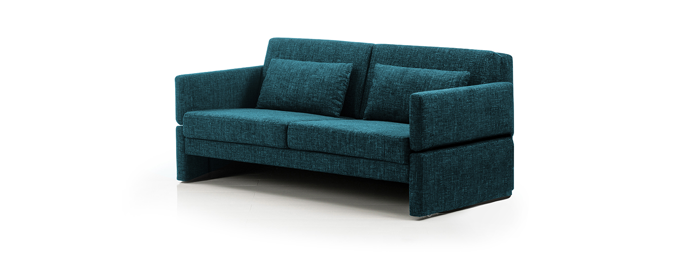 Das Schlafsaofa Cara Deluxe von Brühl in petrolfarbenem Stoff. schlafsofa cara deluxe bruehl