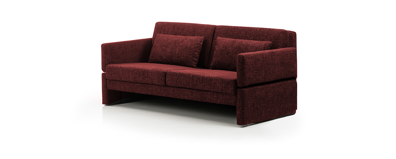 Das Schlafsofa Cara Deluxe von Brühl in rotem Stoff. schlafsofa cara deluxe bruehl rot