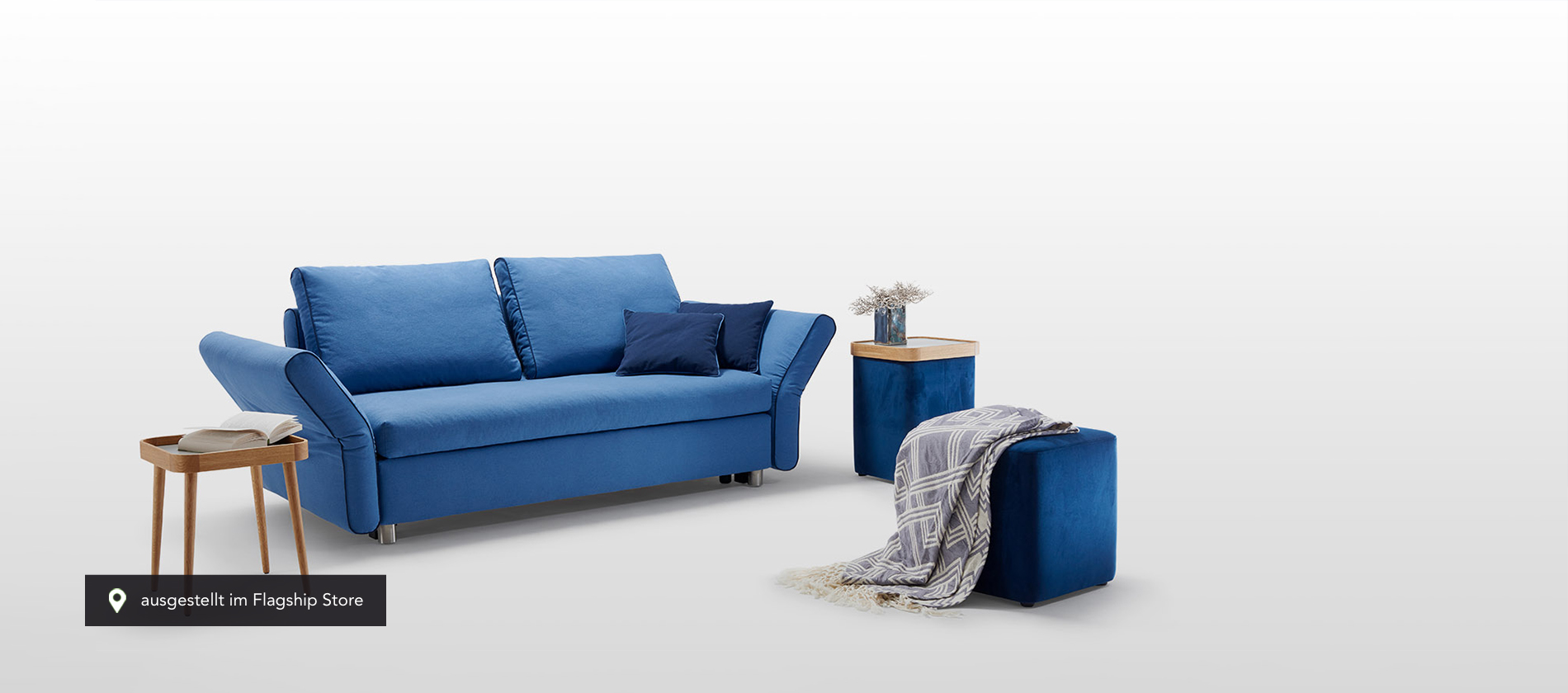 Das Schlafsofa Levi von Signet in blauem Stoff. Schlafsofa Levin Signet blau Stoff